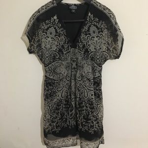 Deep V-neck black and tan mini dress